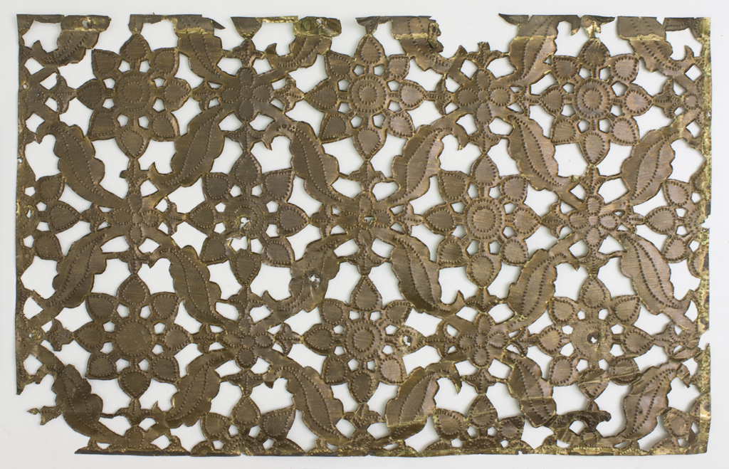 Lockwood de Forest cut metal stencil with eight-lobed floral design